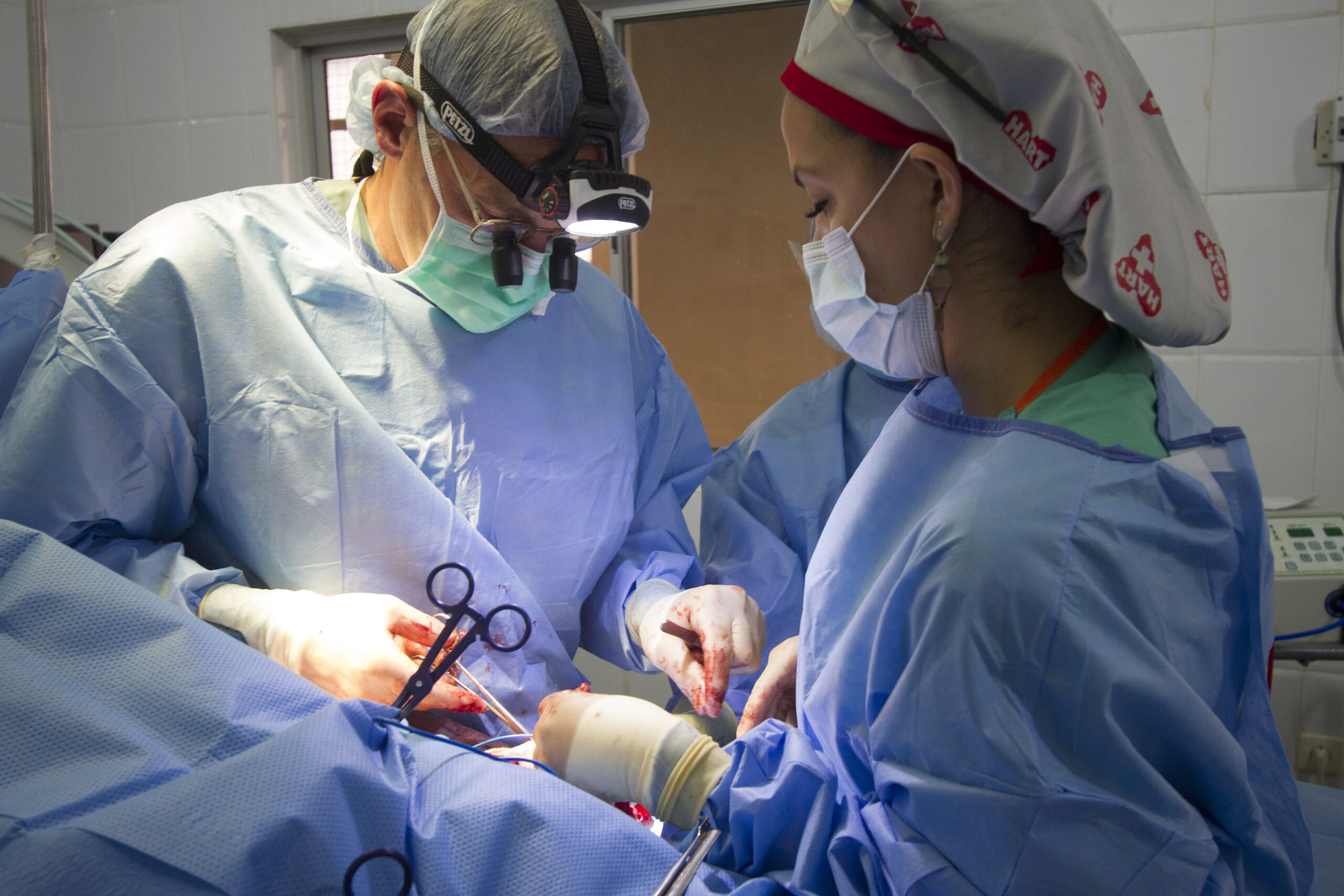 Surgeons operating together on a HART mission
